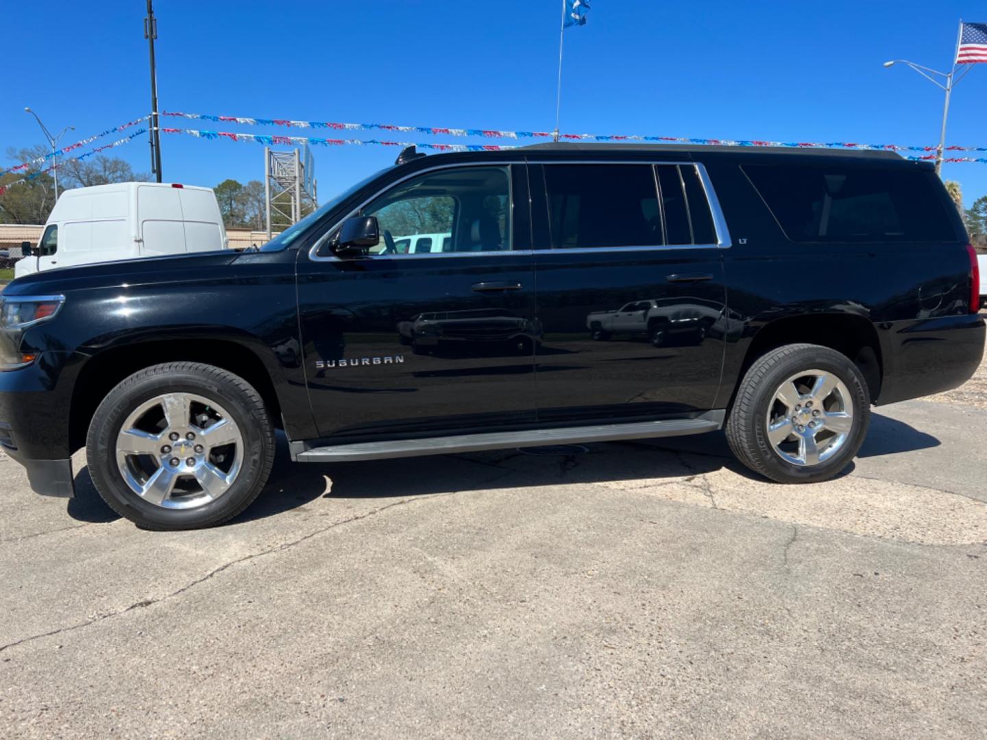 2015 Black /Black Chevrolet Suburban LT (1GNSCJKC9FR) with an 5.3L V8 engine, 6-Speed Automatic transmission, located at 4520 Airline Hwy, Baton Rouge, LA, 70805, (225) 357-1497, 30.509325, -91.145432 - 2015 Chevrolet Suburban LT 5.3 V8 Gas, 184K Miles, Heated Leather Seats, 7 Passenger Seating, Sunroof, Bose, Backup Camera, Does Have Minor Scratches, Tow Pkg. NO IN HOUSE FINANCING. FOR INFO PLEASE CONTACT JEFF AT 225 357-1497 CHECK OUT OUR A+ RATING WITH THE BETTER BUSINESS BUREAU WE HAVE BEEN A - Photo#1